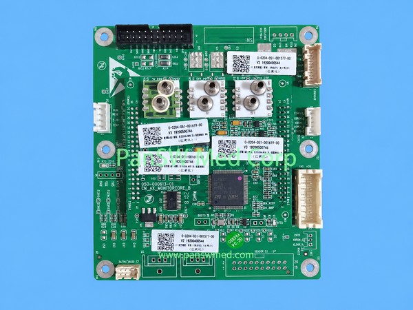 COMEN monitoring board assembly with three paired pneumatic ports and a core module marked 050-000613-01 CM_AX_MONITORCORE_B.