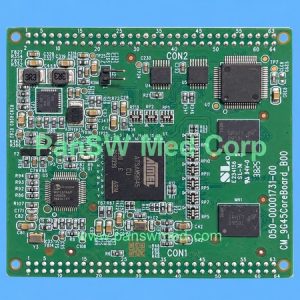COMEN core circuit boards with foreground PCB marked 050-0001731-00 and CM_9G45CoreBoard_B00