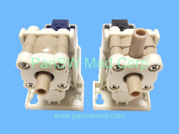 Two Gambro AK 96 solenoid valve assemblies with hose connections and mounting brackets
