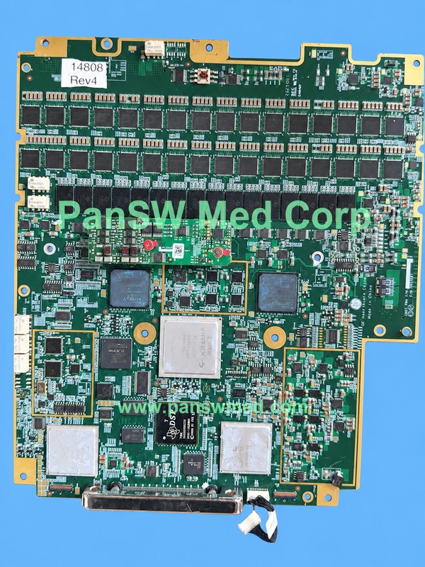 GE circuit board supplied as a CMST mainboard, showing a 14808 Rev4 sticker, mounted daughterboards and a large lower-edge connector.